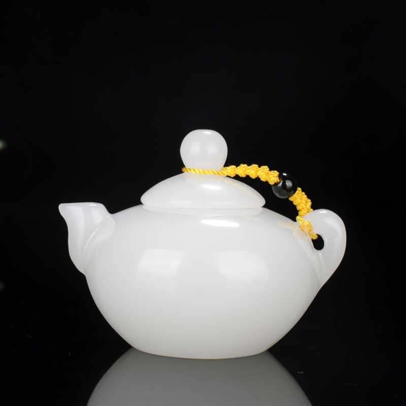 Xinjiang and Tamyu teapot Baiyu to put the Huma to the small teapot handlebar with the original stone handlebar piece jade jewelry
