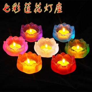 Creative colorful glass for home use in front of Buddha