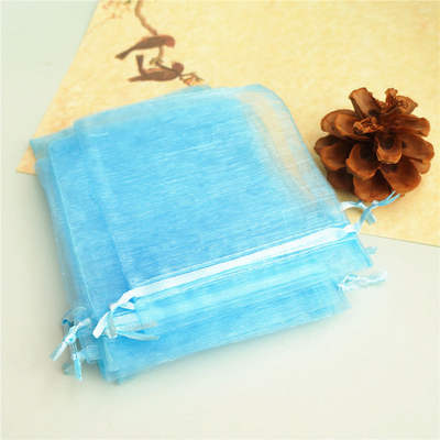 Gift packaging with gauze bags and drawn-out bags