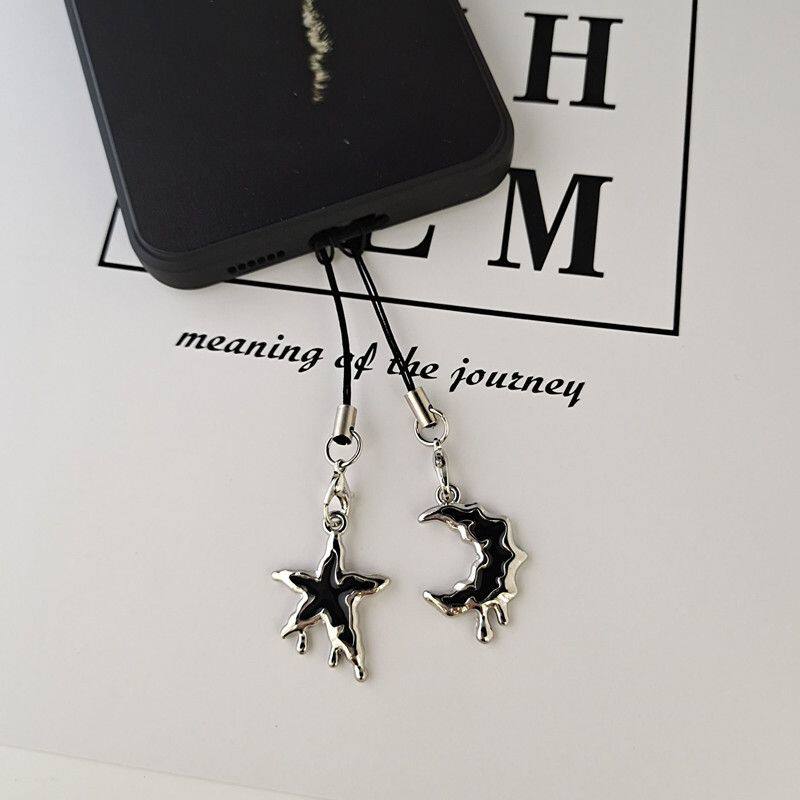 Stylish dark-themed melting star and moon phone charm, high-quality and attractive for couples, best friends, keychains, and bags.