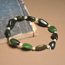 I was stunned by the dialect brand Hetian Jade Xinjiang mature oily red skin spinach green jasper seed material casual bracelet h0