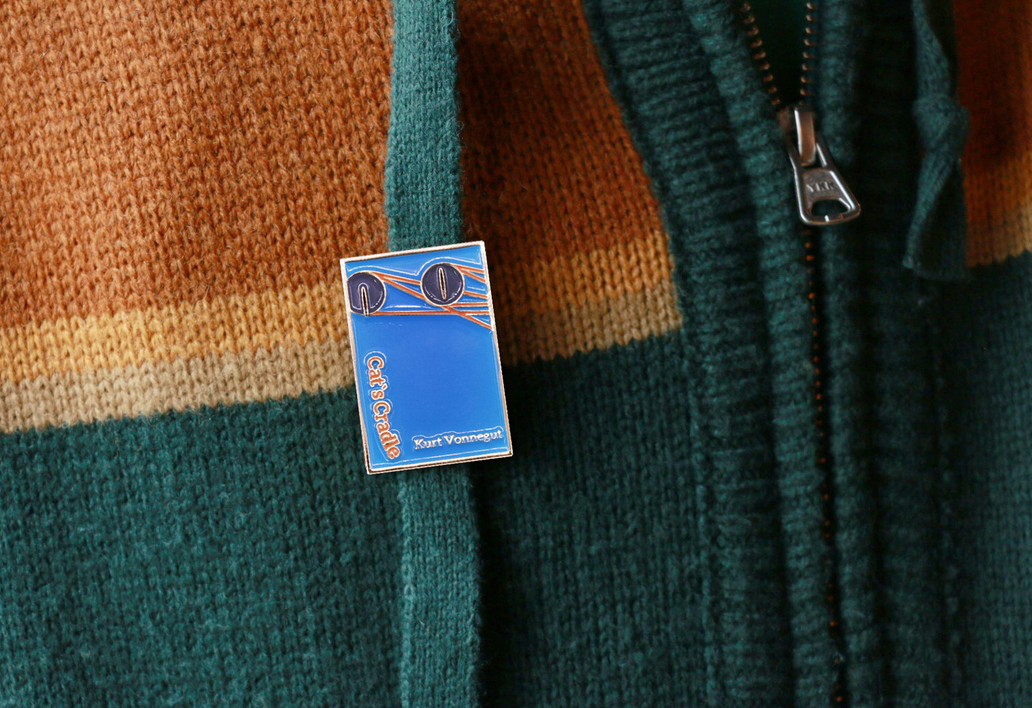 The cradle of the Federal Wallet of the Arts Badge Literary Series cats