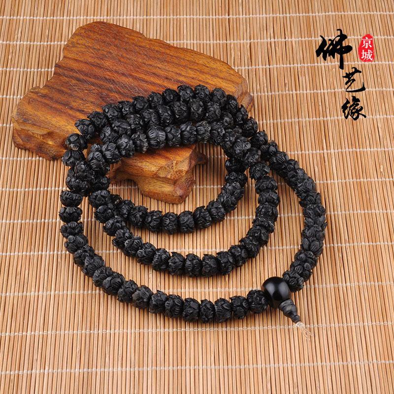 Natural black buffalo horn Buddha pearl 108 candida hand string engraving black lotus hand condensed loose bead