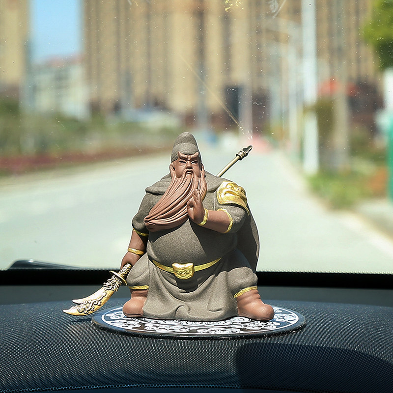 Creative ceramic purple sand car Guanyu Buddha statue in the car of high-end Wu Fortune Sheng Car decoration