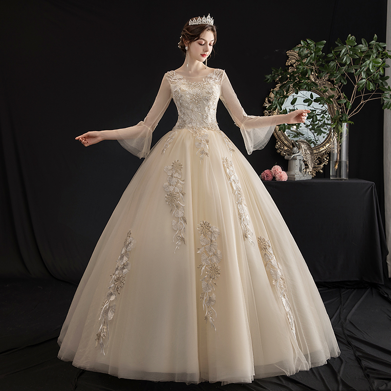 Main wedding dress 2021 new bride thin champagne color Sen department one-shoulder long-sleeved Qi Di summer dream light veil