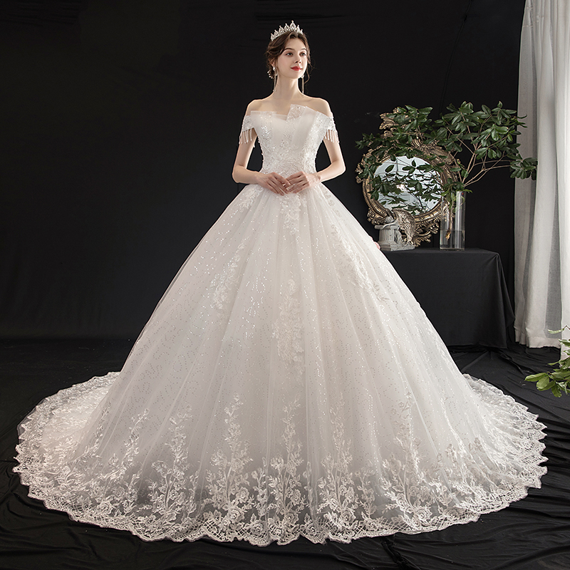 One-word shoulder main wedding dress 2021 new French light female bride trailing luxury Qiqieson simple slim