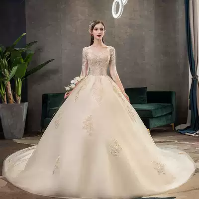 Wedding dress 2021 new bride V collar long tailed skirt Palace luxury Net red tremble sound champagne color sensori shoulder