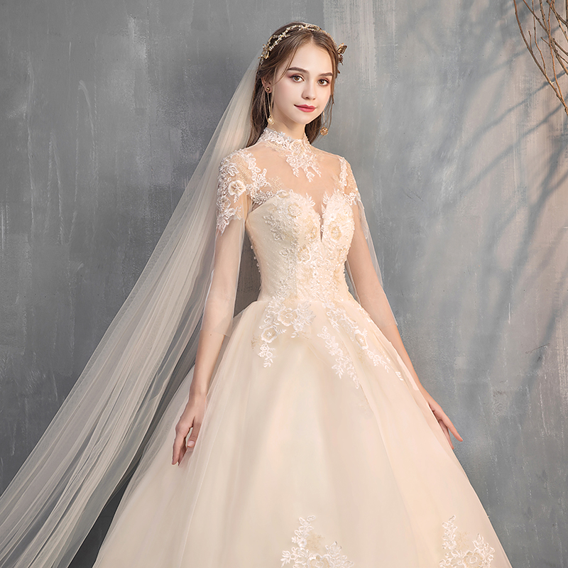 Main light wedding dress 2021 new bride thin champagne color Sen department one shoulder high collar long sleeve simple French dream