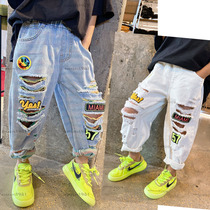 Brand 2021 spring dress new childrens clothing men and womens children loose hole old father pants denim trousers 1981