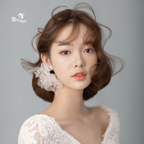 Beautiful Sen department Juan yarn beaded drop earrings Ear clip Bridal wedding dress accessories Photo studio photography with makeup styling head