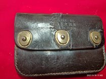 A cow leather purse wallet with a purse.