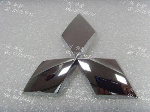 Mitsubishi Label in front of Mitsubishi Label in front of Mitsubishi Label