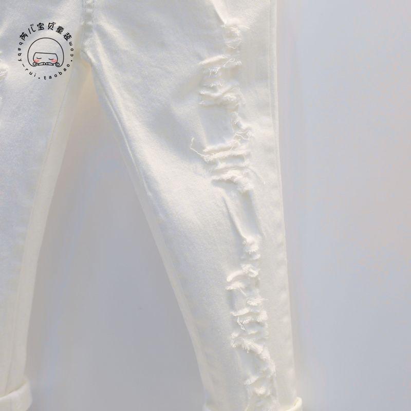 Bé gái 2018 thu đông trẻ em mới sinh em bé 2 đến 7 tuổi quần jeans bút chì lỗ hoang quần áo sành điệu cho be gái