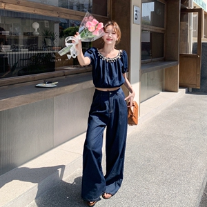 蓝色复古高级感牛仔套装女2025年夏季新款一字肩上衣阔腿裤两件套图片