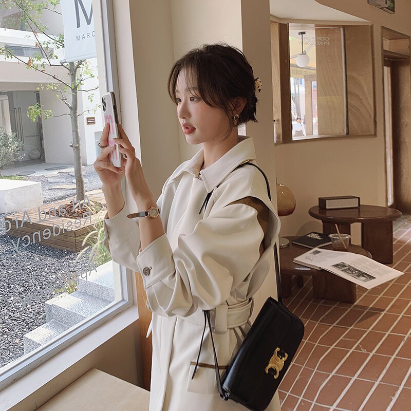 【主推】2026高级感炸街设计白色风衣2C372-1807-P145控198,女装风衣,2C372