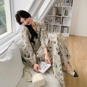 水墨画法式温柔风碎花长袖连衣裙女春秋2024新款设计感V领长裙子图片