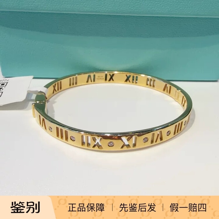 99% New Tiffany Roman Numeral Bracelet 18K Gold Seven Diamonds 99% New Tiffany Roman Numeral Bracelet 18K Gold Seven Diamonds
