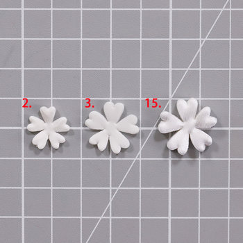 Beauty Sakura machine-cut small flower pieces, hot flower fabric supporting material, 50 ຕ່ອນ