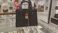Xiaoyiyi MK Outlet new Hamilton lock bag crossbody bag North America genuine direct mail