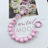 Розовые висящие веревочных бусин