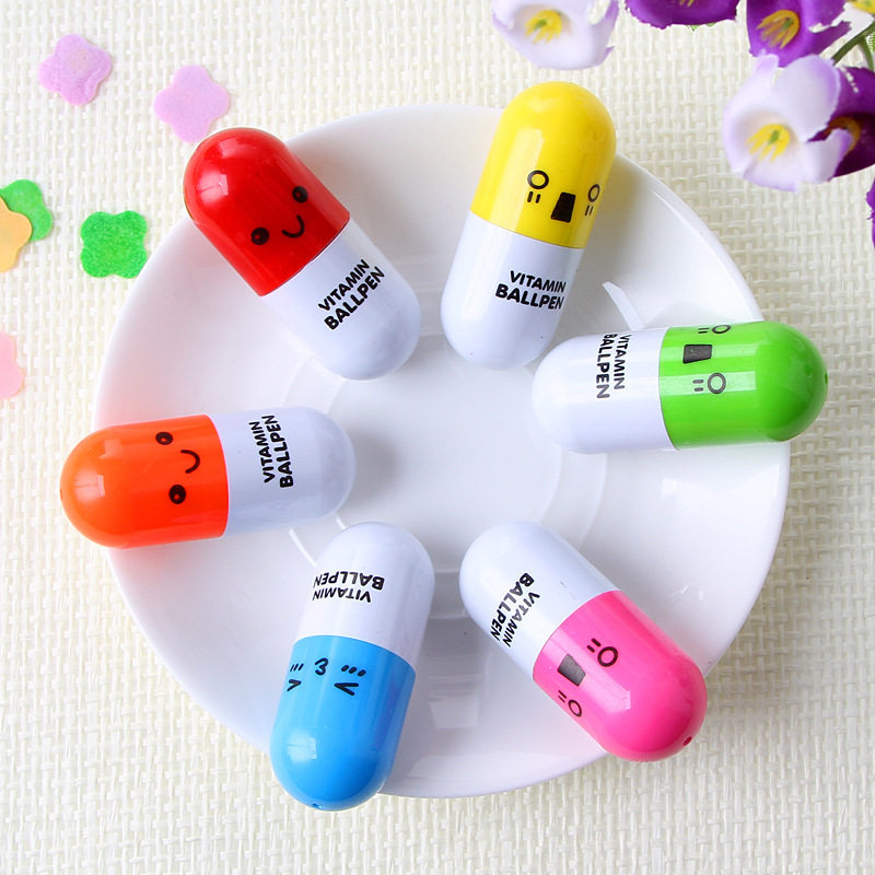 Korean creative cute smiling face expression pill pen 0 7mm cartoon telescopic ballpoint pen primary school student reward gift