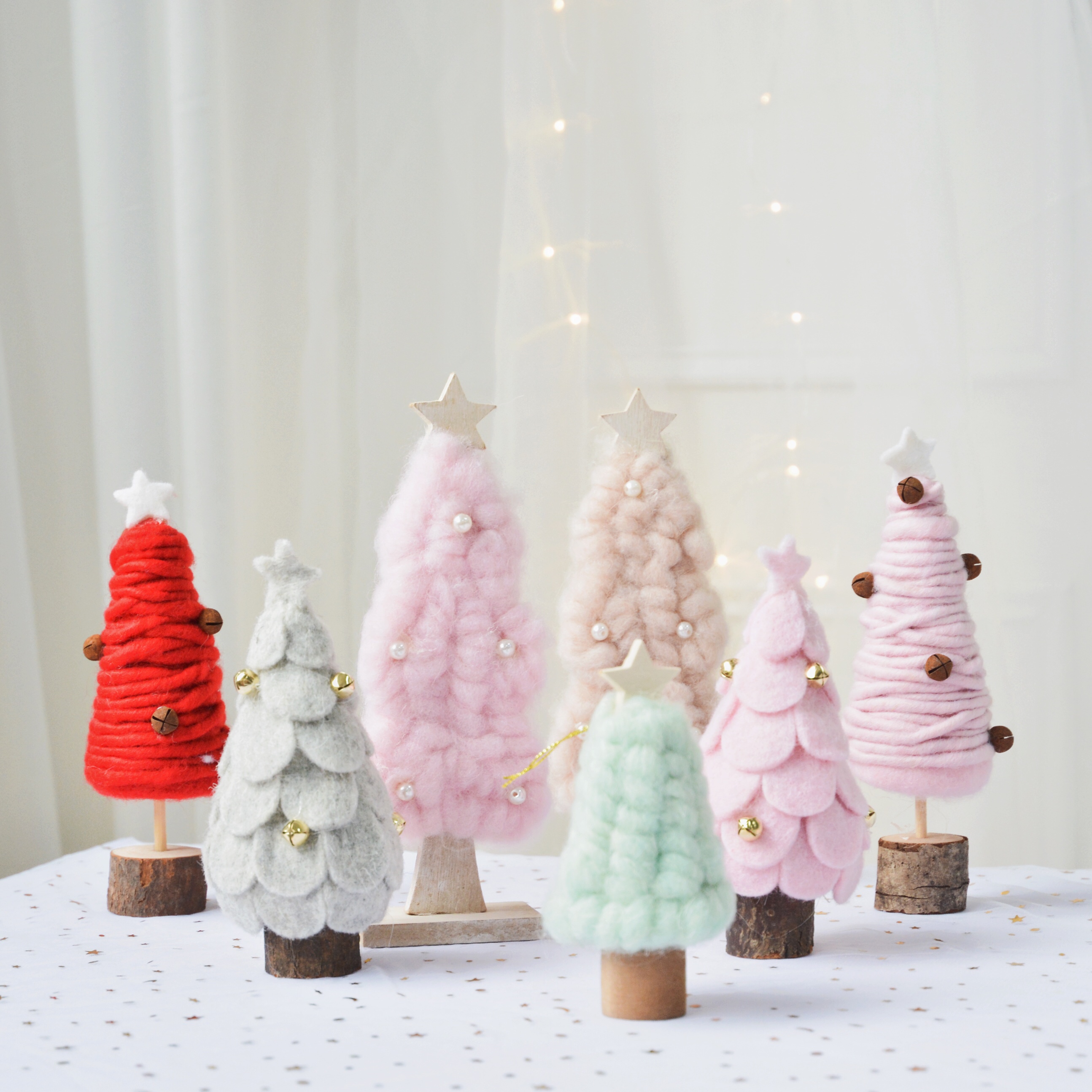 SwanLace is beautiful in Korea with the same wooden pearl bell wool wool wool felt layered pine tree-shaped ornament