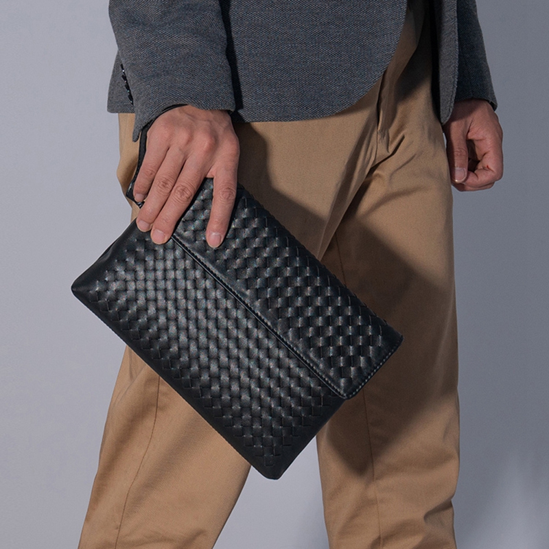 Hong Kong duty-free men's handbag leather leather cover bag Young fashion business handbag weaving bag bag