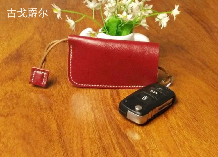 Châu Âu và Hoa Kỳ phiên bản retro được cá nhân hóa của dây rút loại dây da trường hợp chìa khóa xe đặt da bò nam và nữ dây móc ví nam