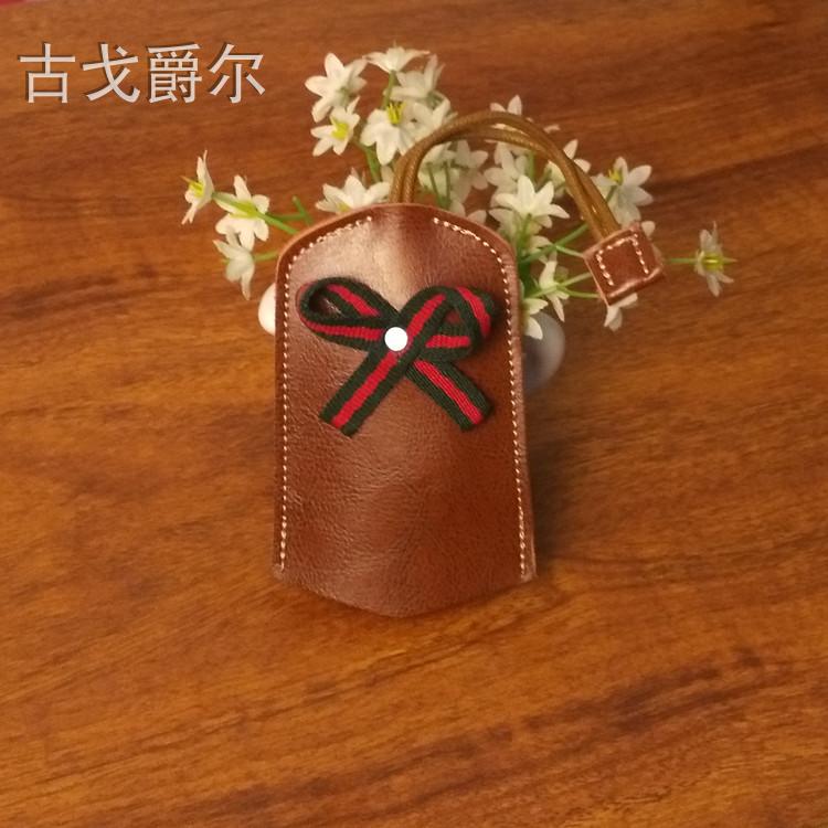 Túi da chìa khóa phổ thông sáng tạo nơ cá tính kéo ra túi chìa khóa bảo vệ da móc khóa túi mini
