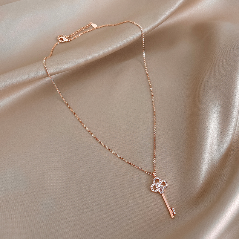 Caring Koko ~ 2021 new wave inlaid drill key necklace woman small crowd design sense pendant lock bone necklace woman