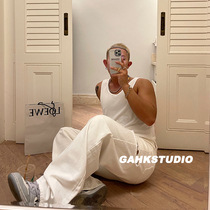 GAHKSTUDIO big name spring summer couture side design hole casual white pants