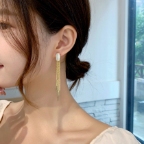 Cats eye stone long tassel earrings 2021 New Tide senior sense face small silver needle niche brand earring female