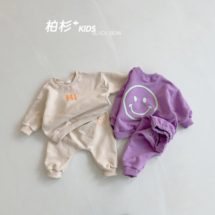 Korean children's clothing 2022 spring and autumn children's smiling face casual thick cotton suit baby sports thick cotton pants two-piece Western style