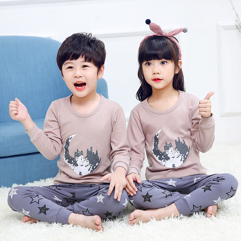 Xuân Thu childrens mùa thu quần áo bộ đồ ngủ cotton bé trai childrens quần áo ấm lót bông quần cô gái mùa thu.