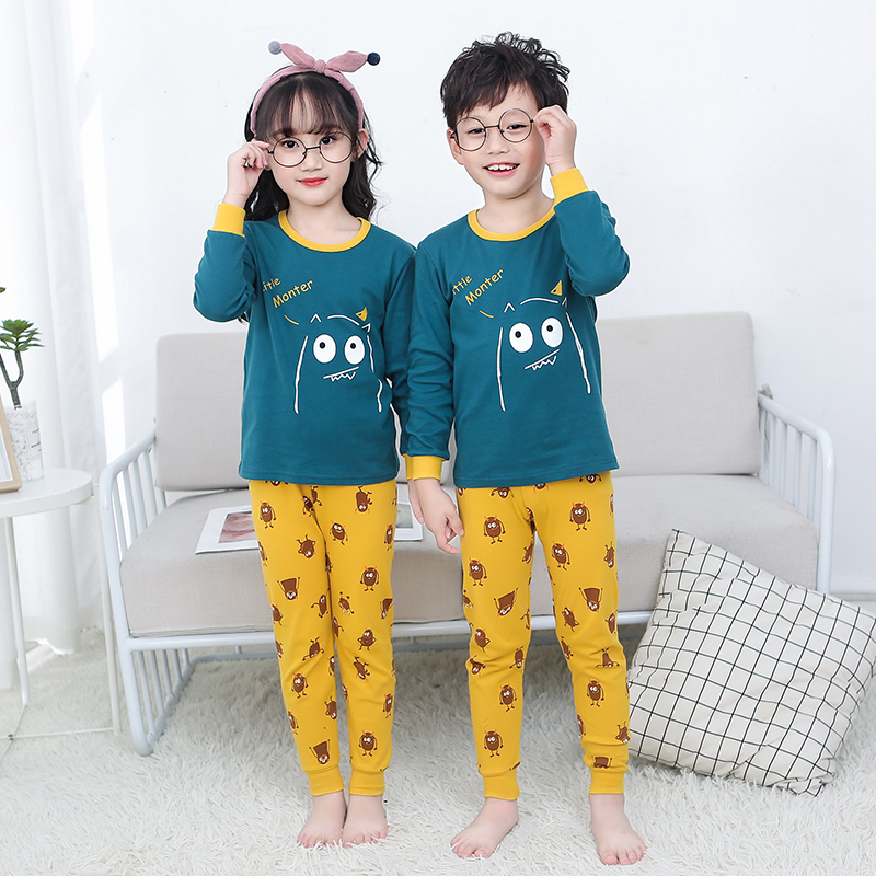 Xuân Thu childrens mùa thu quần áo bộ đồ ngủ cotton bé trai childrens quần áo ấm lót bông quần cô gái mùa thu.