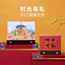 2023 - calendar calendar desktop papers tabletop papers hands torn pieces in the Palace of Time