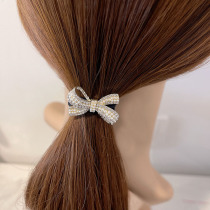 Xiaoqing New Pearl Butterfly Bow Rope Adult Hairloop with Simple Fashion Zama Tail Head Rope
