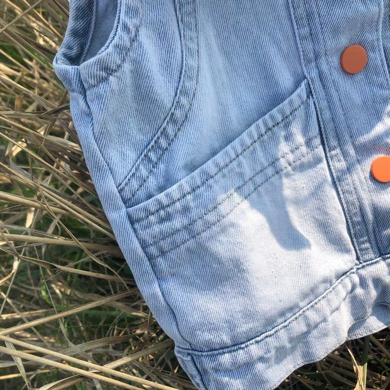 Áo khoác denim trẻ em mùa xuân cam đầu gấu - Áo ghi lê