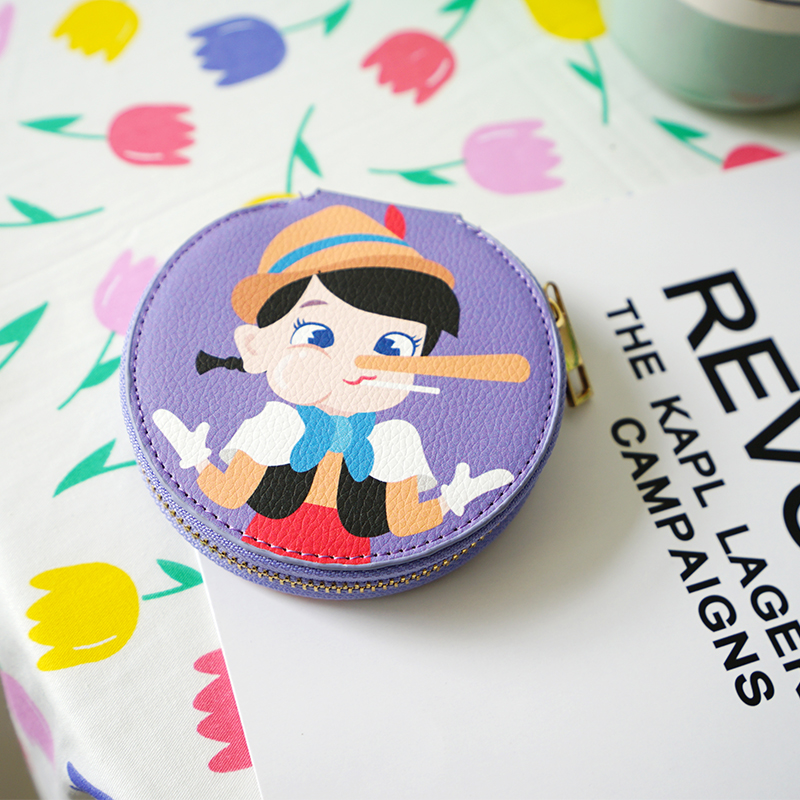 A mini - cartoon coin pack that can be used to make decorative wallet for daily carry - on pockets