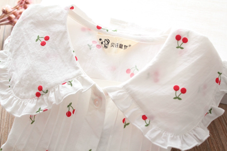 Mùa thu 2018 bé gái mặc áo sơ mi trắng cotton cotton dễ thương bên tai in áo sơ mi cherry trẻ em