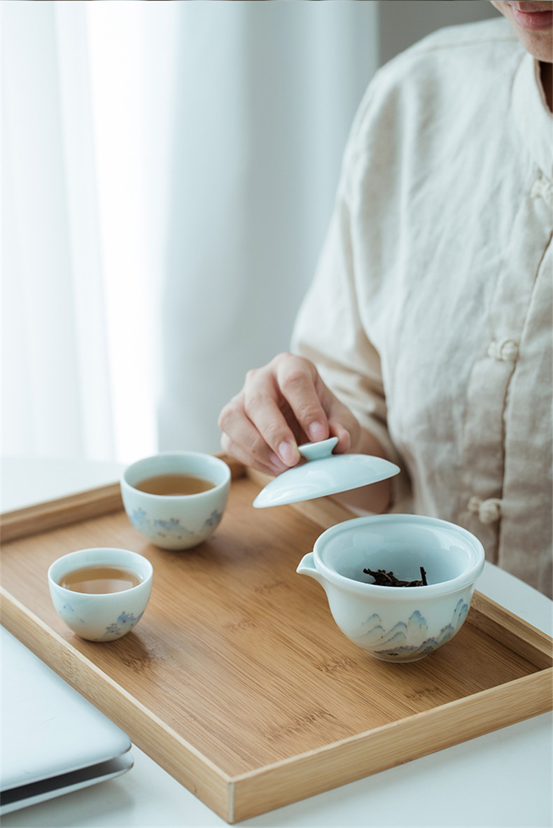 Jingdezhen single tourism kung fu tea sets, small portable is suing travel pure hand - made crack cup a pot of two cup