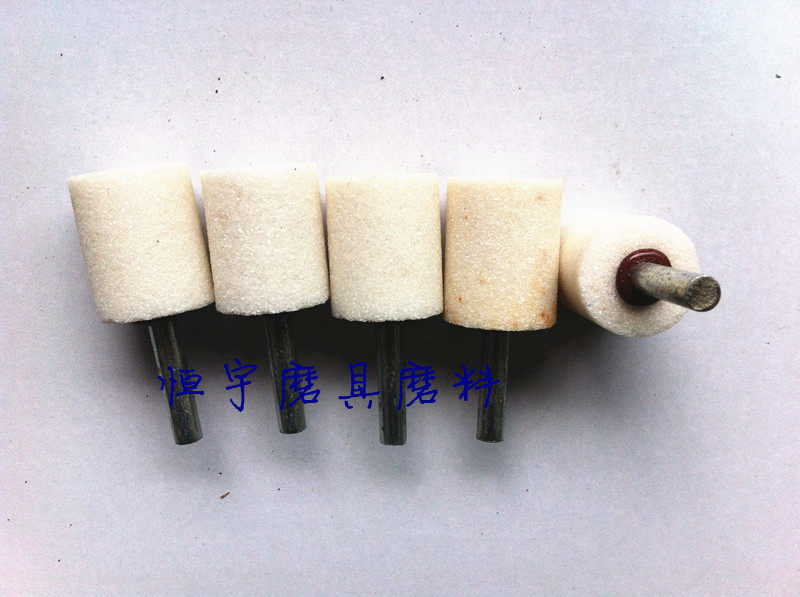 The white corundum 6MM handle cylindrical WA grinding wheel polishing metal rust drill grinding head is used to grind the head