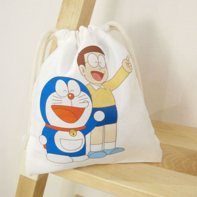 totu Doraemon cartoon large cotton travel drawstring pocket baby clothing storage bag custom cloth bag