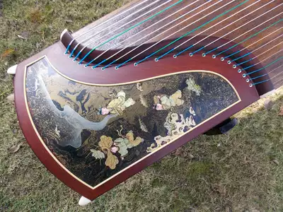 Dunhuang Guzheng 7691p teak floating light color boy playing Shanghai national musical instrument factory