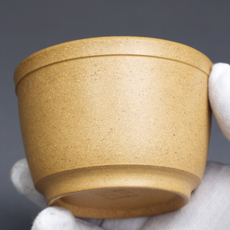 Yixing purple sand cup famous hand-made tea cup of raw mineral yellow slope master cup Kung fu tea cup