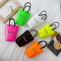 Childrens shoulder bag baby shoulder bag 2021 girl new fluorescent hand bag letter Net red small bucket bag
