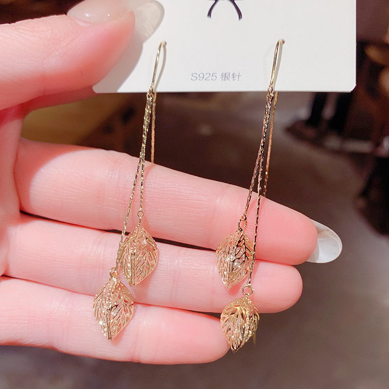 s925 silver needle hollowed-out solid one leaf storm rich flow Su anti-lose ear necklace Korean temperament net red fashion long version earrings