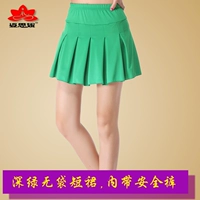 Темно -зеленая короткая юбка