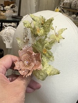 Megao original contrasting color handmade new Chinese style bridal headwear and makeup styling wedding Xiuhe accessories sample shooting