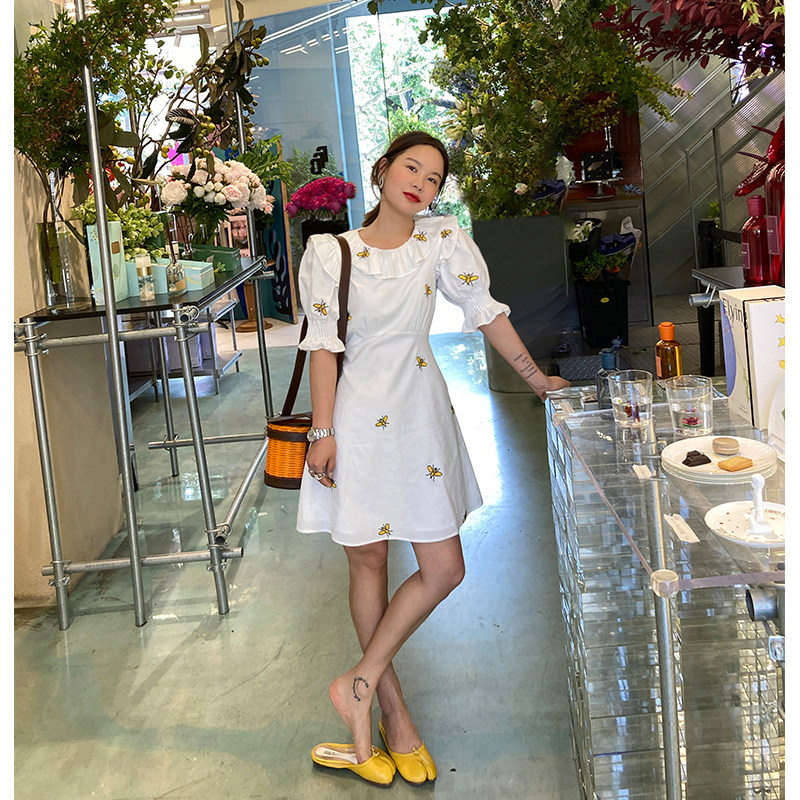 WXLSTUDIO white embroidered foreign dress Women 2021 Summer new lotus leaf side horn sleeves in long skirts